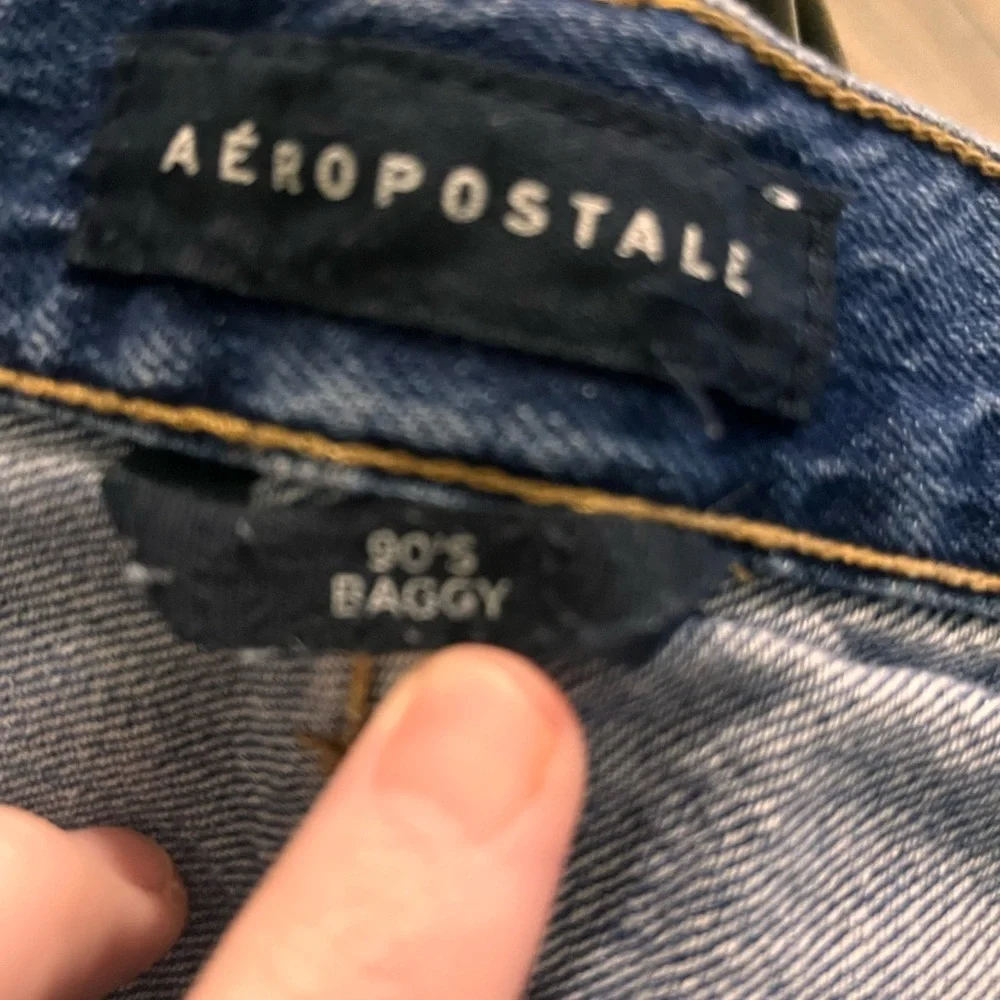 Distressed Blue Jeans